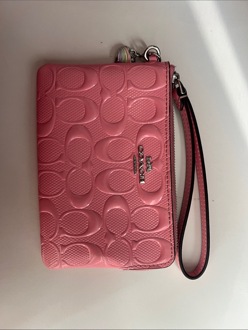 Coach Pink Signature Embossed Wristlet with Charm